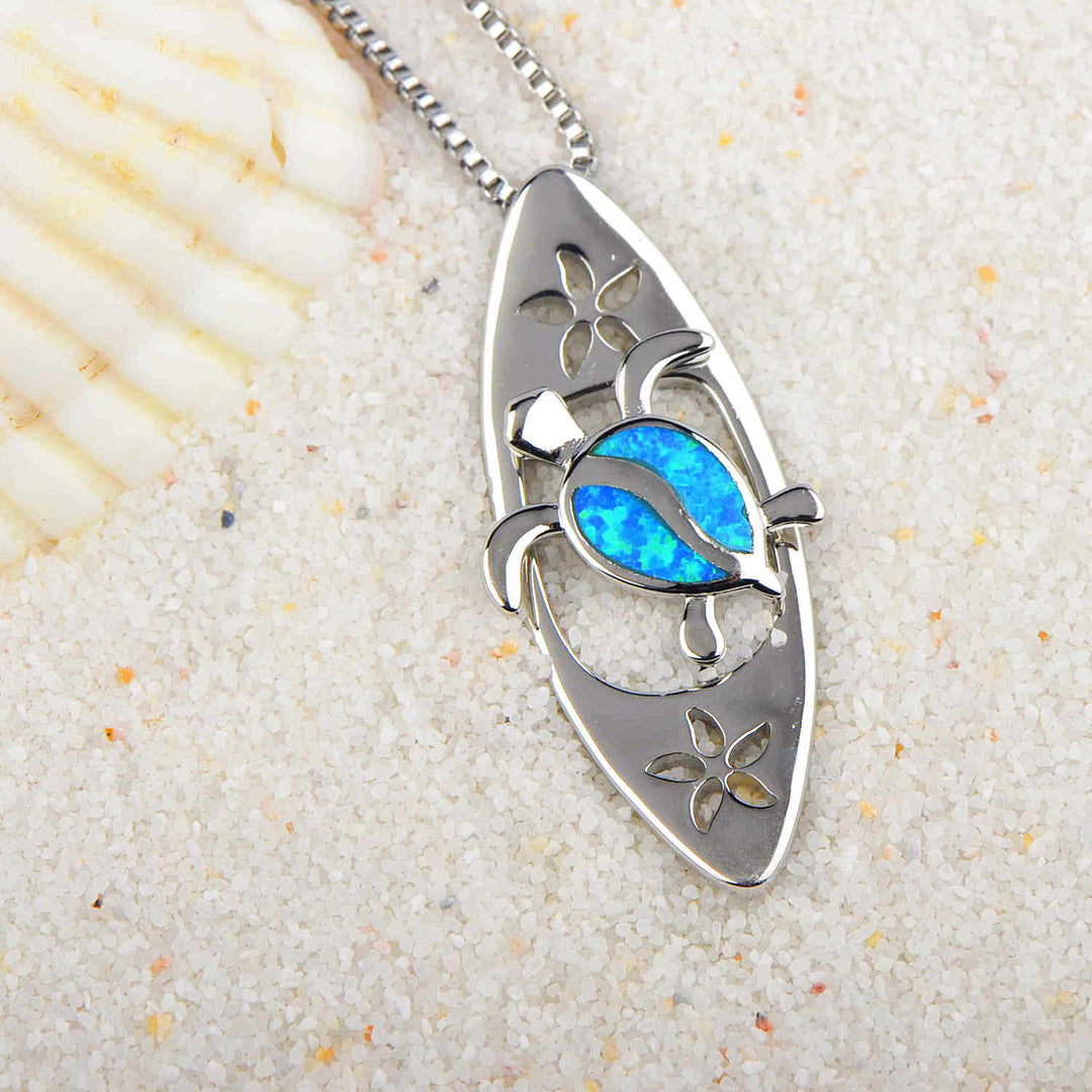 Collier avec pendentif tortue en forme de planche de surf en opale bleue Olivenorma