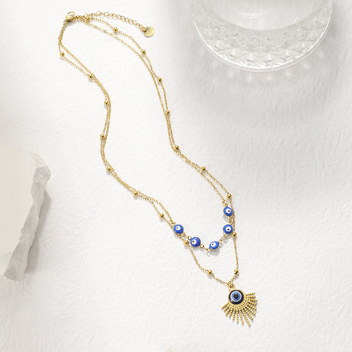Collier double couche contre le mauvais œil à colle bleue Olivenorma 