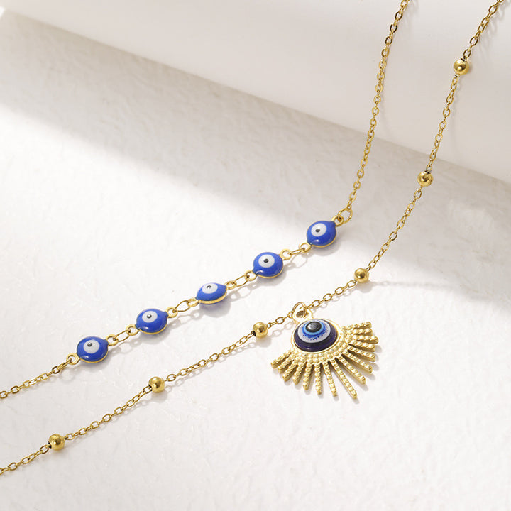 Collier double couche contre le mauvais œil à colle bleue Olivenorma 