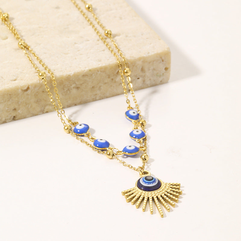 Collier double couche contre le mauvais œil à colle bleue Olivenorma 