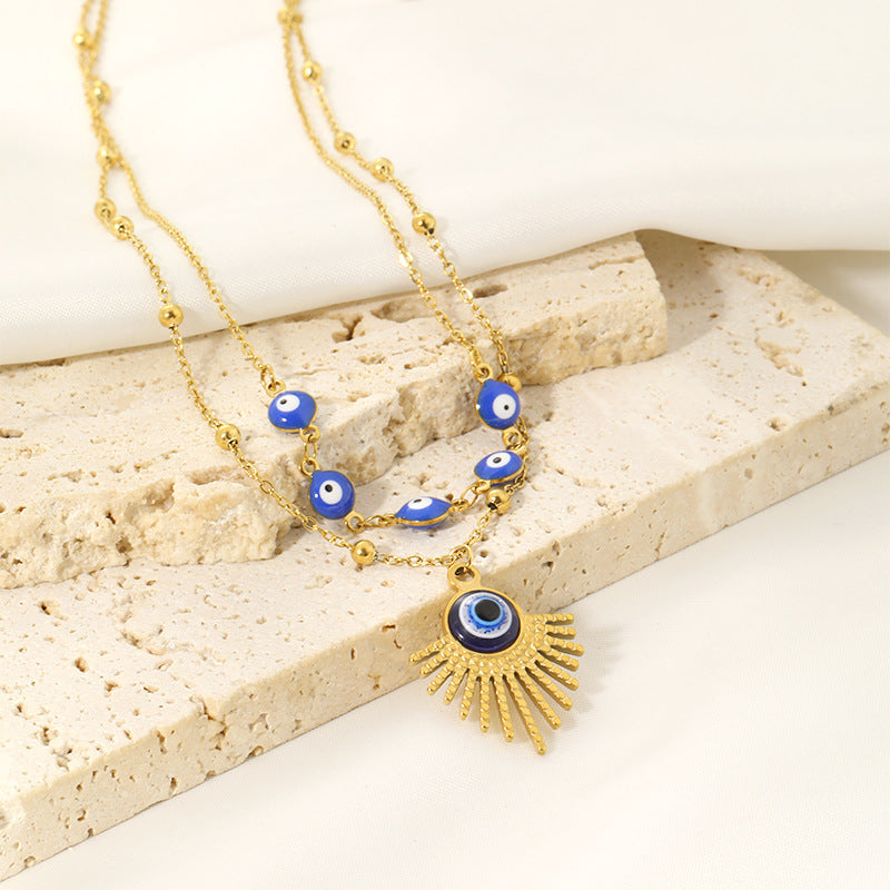 Collier double couche contre le mauvais œil à colle bleue Olivenorma 