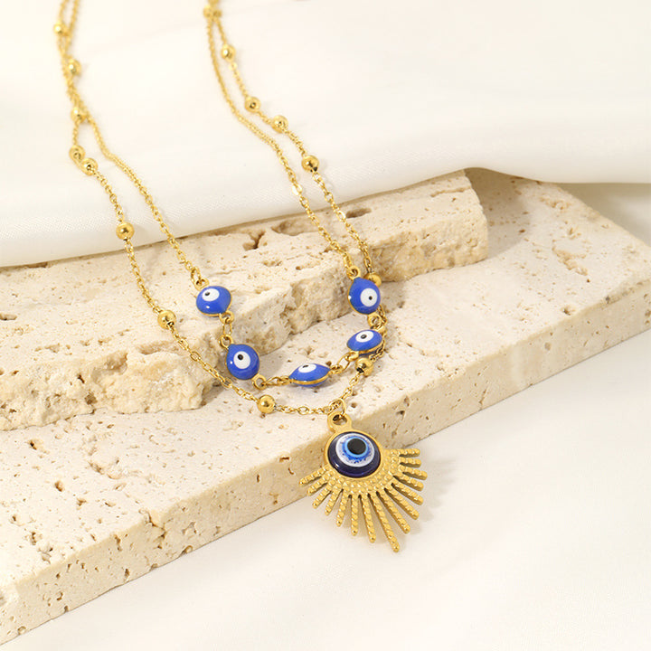 Collier double couche contre le mauvais œil à colle bleue Olivenorma 
