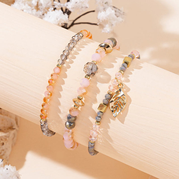 Ensemble de bracelets à trois rangs avec pendentif en feuille d'or et perles de cristal Olivenorma