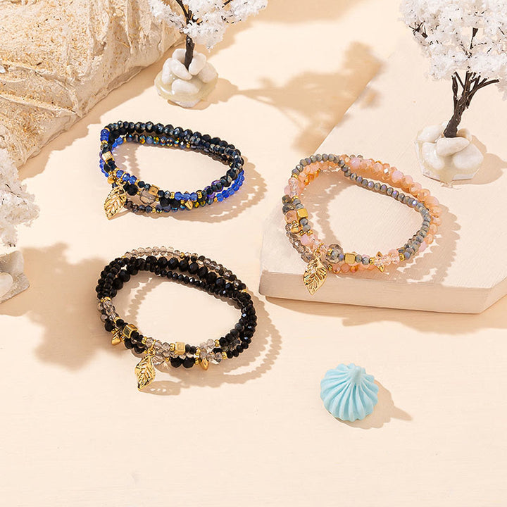 Ensemble de bracelets à trois rangs avec pendentif en feuille d'or et perles de cristal Olivenorma