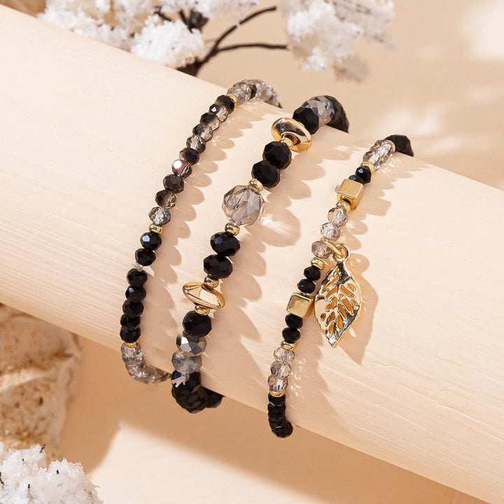 Ensemble de bracelets à trois rangs avec pendentif en feuille d'or et perles de cristal Olivenorma