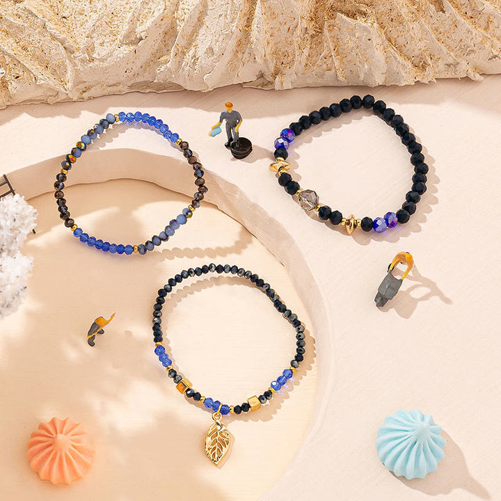Ensemble de bracelets à trois rangs avec pendentif en feuille d'or et perles de cristal Olivenorma
