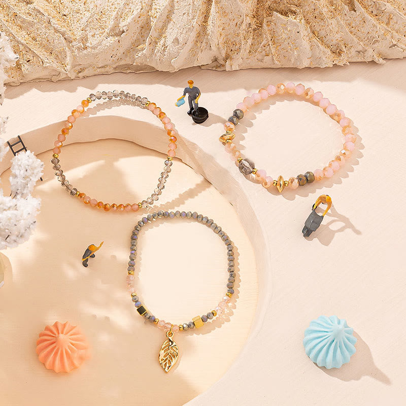 Ensemble de bracelets à trois rangs avec pendentif en feuille d'or et perles de cristal Olivenorma