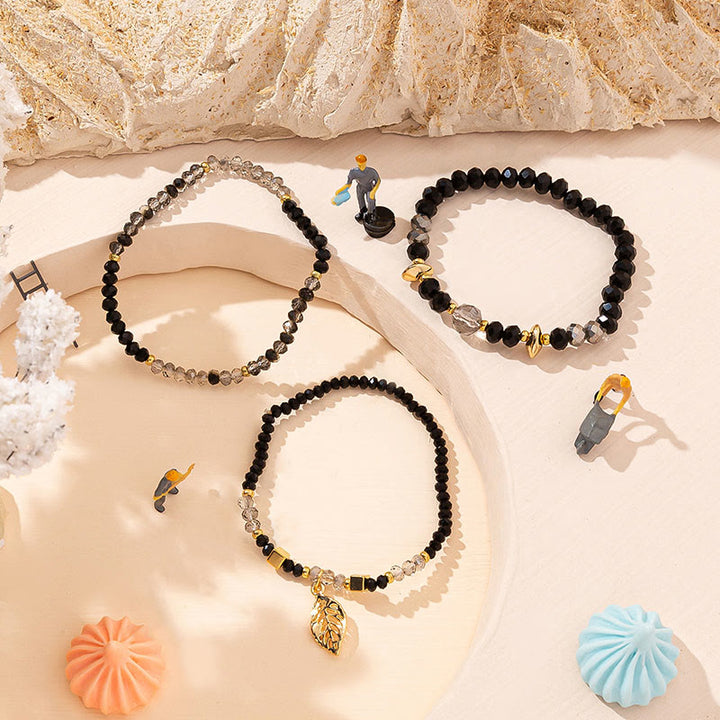 Ensemble de bracelets à trois rangs avec pendentif en feuille d'or et perles de cristal Olivenorma