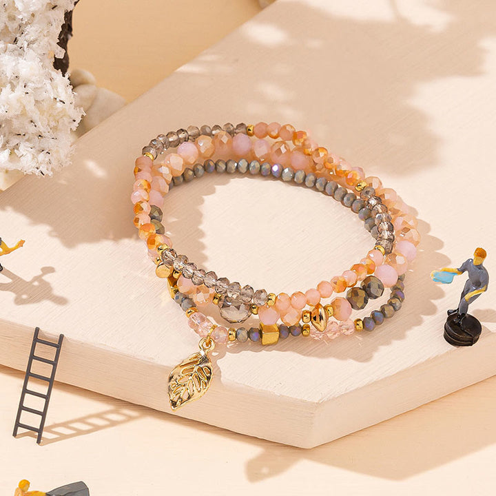 Ensemble de bracelets à trois rangs avec pendentif en feuille d'or et perles de cristal Olivenorma