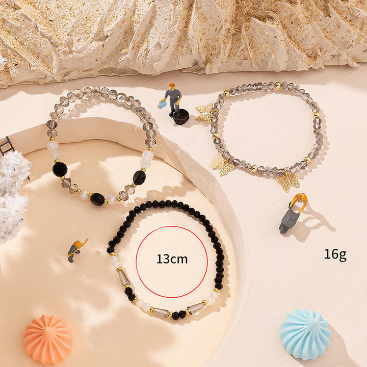 Ensemble de bracelets à trois rangs avec pendentif papillon en or et perles de cristal Olivenorma