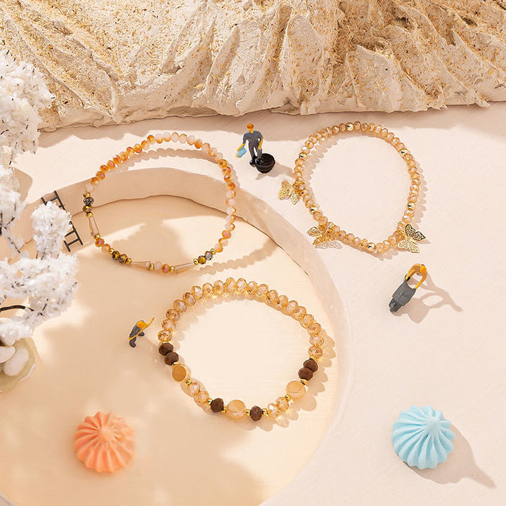 Ensemble de bracelets à trois rangs avec pendentif papillon en or et perles de cristal Olivenorma
