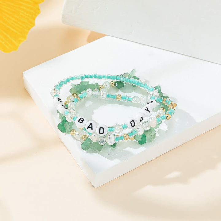 Ensemble de bracelets à trois rangs en perles de cristal Olivenorma « No Bad Days » 