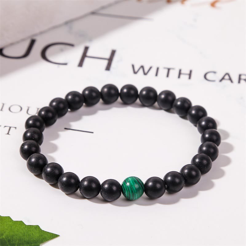 Bracelet Olivenorma en perles de malachite et onyx noir 8 mm