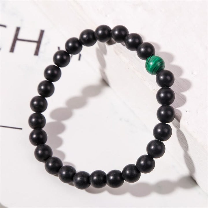 Bracelet Olivenorma en perles de malachite et onyx noir 8 mm