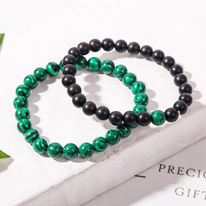 Bracelet Olivenorma en perles de malachite et onyx noir 8 mm