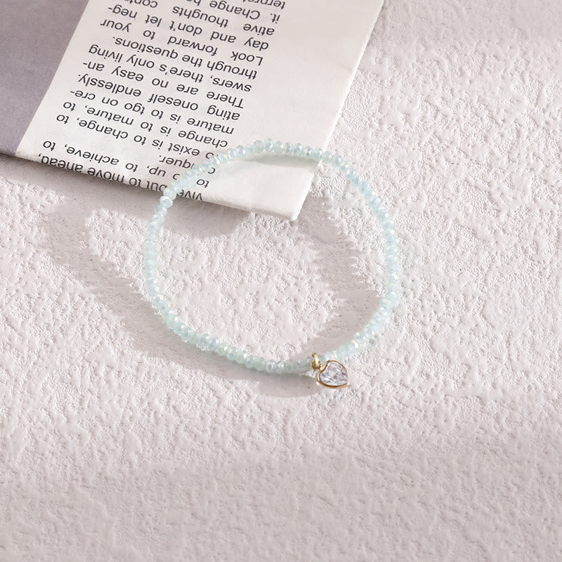 Bracelet Olivenorma avec pendentif en zircon blanc et perles de riz colorées
