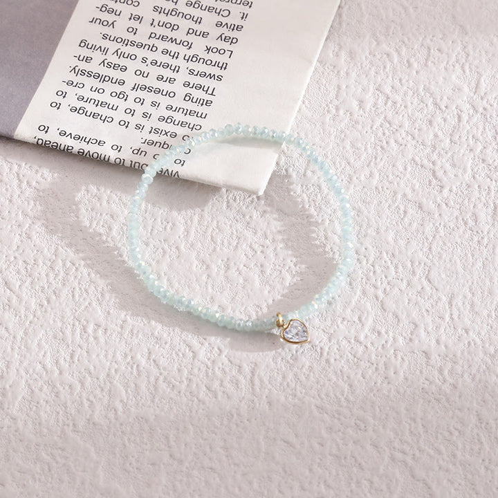 Bracelet Olivenorma avec pendentif en zircon blanc et perles de riz colorées
