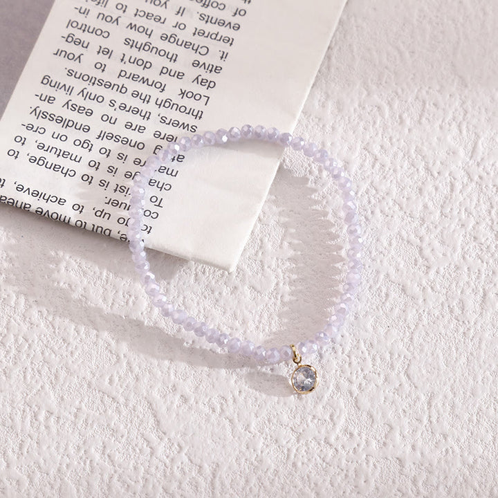 Bracelet Olivenorma avec pendentif en zircon blanc et perles de riz colorées