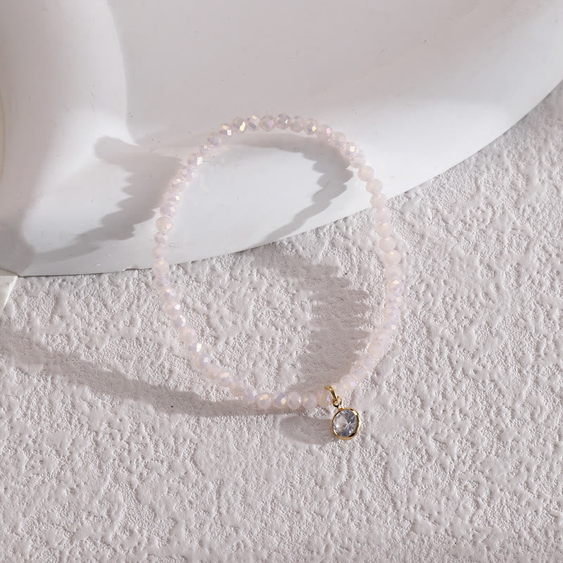 Bracelet Olivenorma avec pendentif en zircon blanc et perles de riz colorées