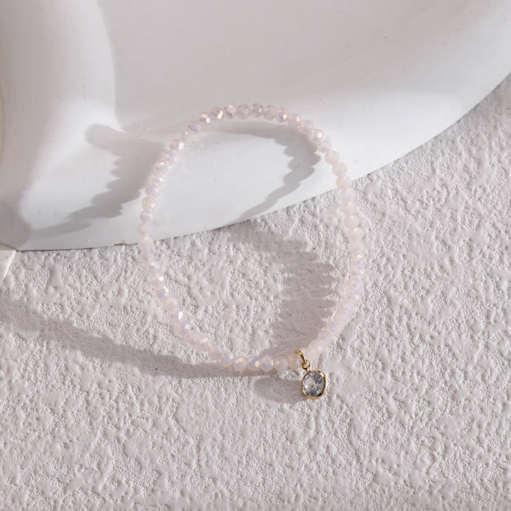 Bracelet Olivenorma avec pendentif en zircon blanc et perles de riz colorées