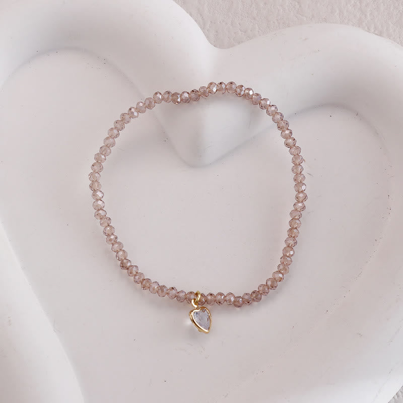 Bracelet Olivenorma avec pendentif en zircon blanc et perles de riz colorées