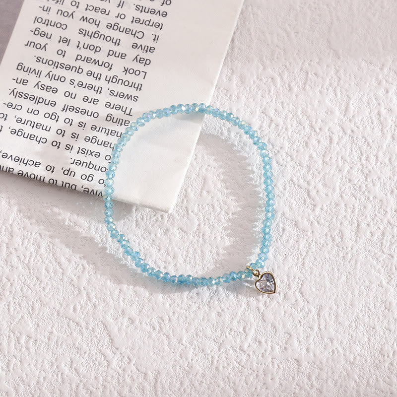 Bracelet Olivenorma avec pendentif en zircon blanc et perles de riz colorées
