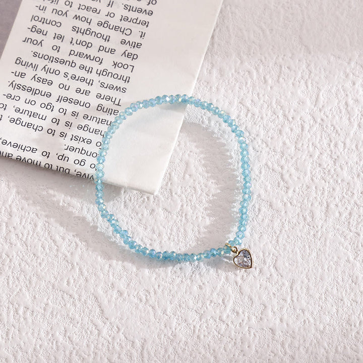 Bracelet Olivenorma avec pendentif en zircon blanc et perles de riz colorées