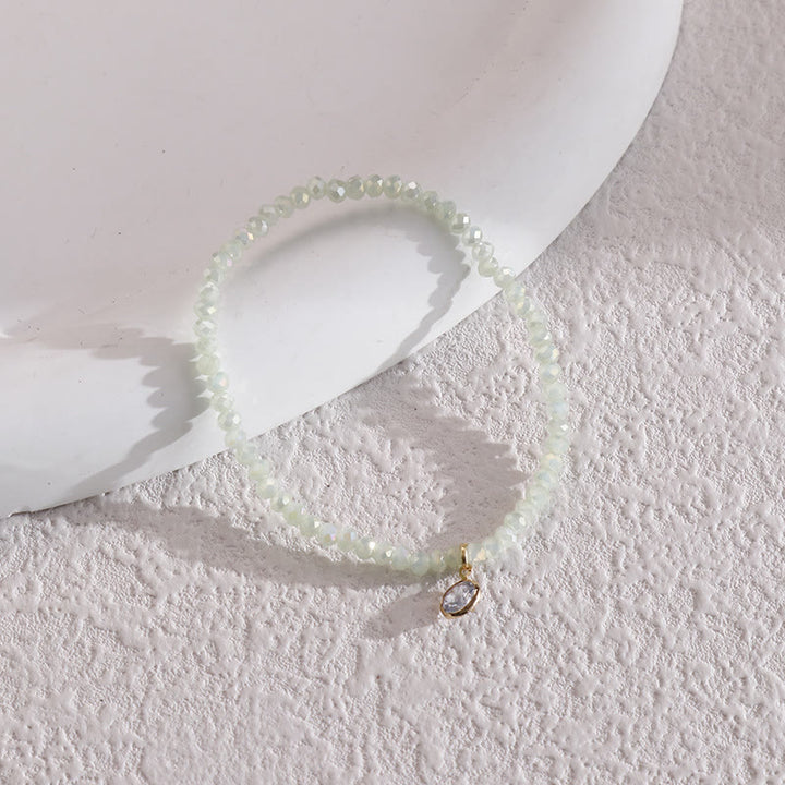 Bracelet Olivenorma avec pendentif en zircon blanc et perles de riz colorées