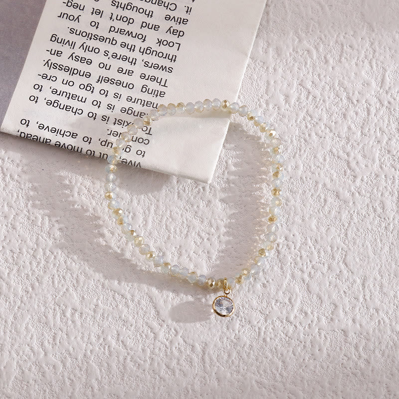 Bracelet Olivenorma avec pendentif en zircon blanc et perles de riz colorées
