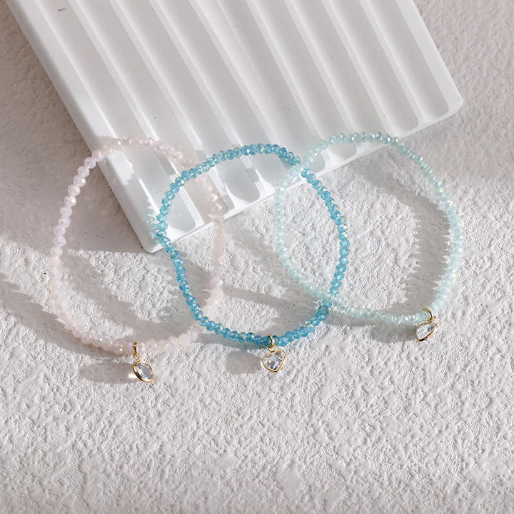 Bracelet Olivenorma avec pendentif en zircon blanc et perles de riz colorées