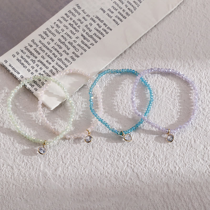 Bracelet Olivenorma avec pendentif en zircon blanc et perles de riz colorées