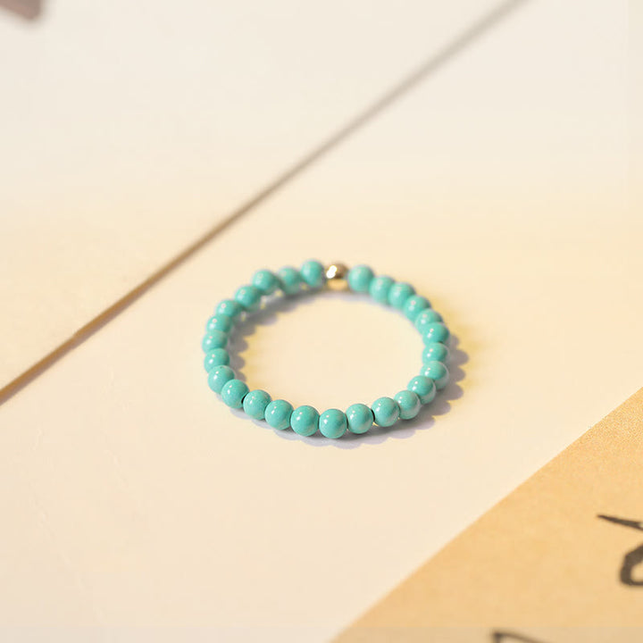 Bague Olivenorma en perles turquoise extra fines de 2 mm