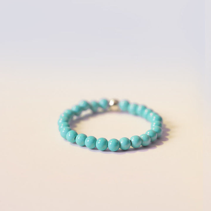 Bague Olivenorma en perles turquoise extra fines de 2 mm