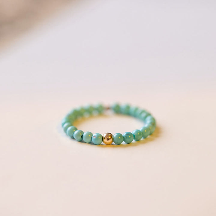 Bague Olivenorma en perles turquoise extra fines de 2 mm