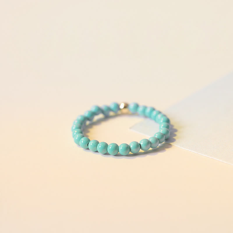 Bague Olivenorma en perles turquoise extra fines de 2 mm