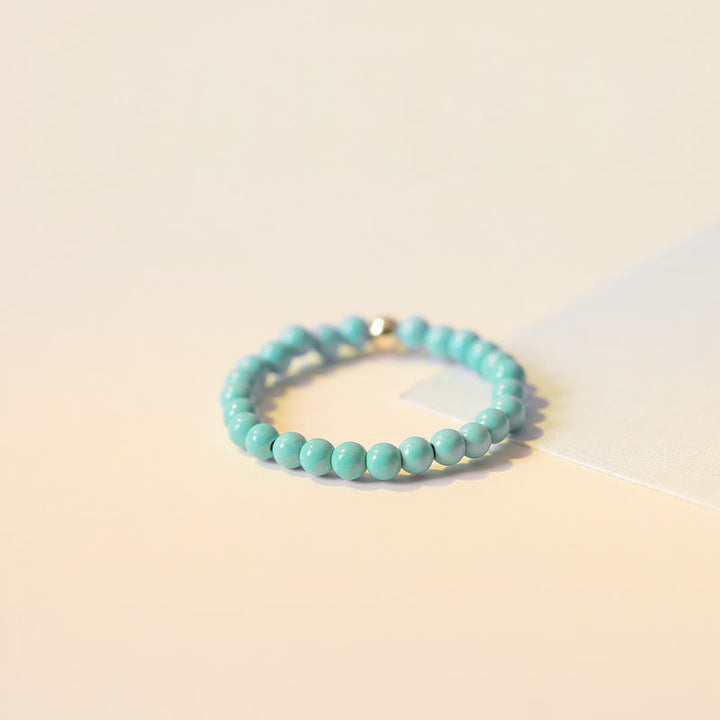 Bague Olivenorma en perles turquoise extra fines de 2 mm