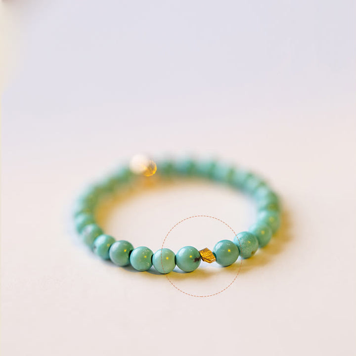 Bague Olivenorma en perles turquoise extra fines de 2 mm