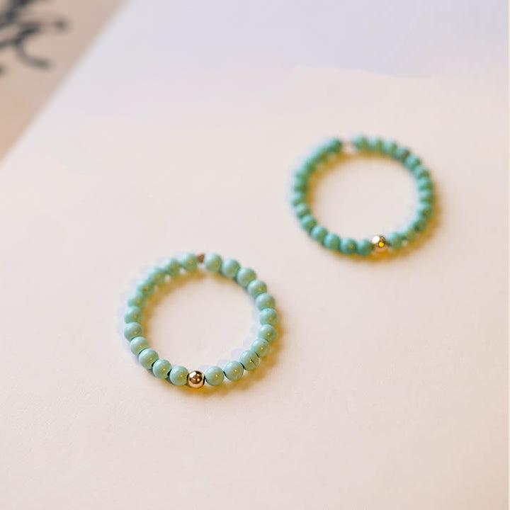 Bague Olivenorma en perles turquoise extra fines de 2 mm