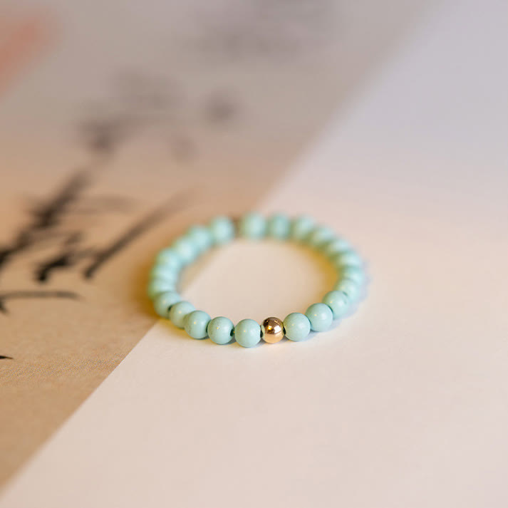 Bague Olivenorma en perles turquoise extra fines de 2 mm