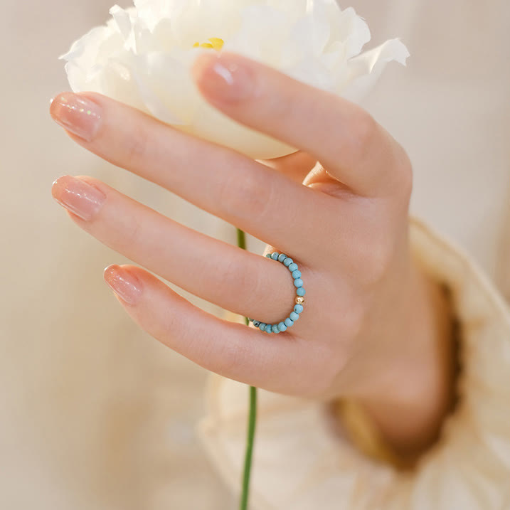 Bague Olivenorma en perles turquoise extra fines de 2 mm