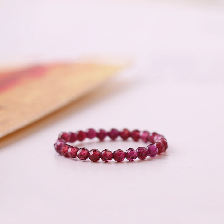 Olivenorma avec perle de grenat extra fine de 2 mm
