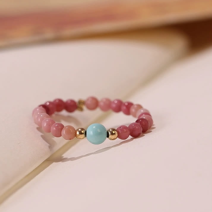Bague Olivenorma en perles de rhodochrosite extra fines de 2 mm