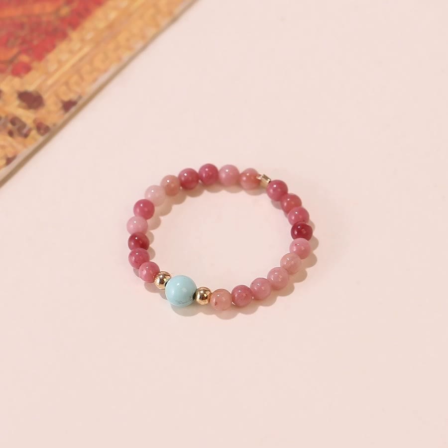 Bague Olivenorma en perles de rhodochrosite extra fines de 2 mm