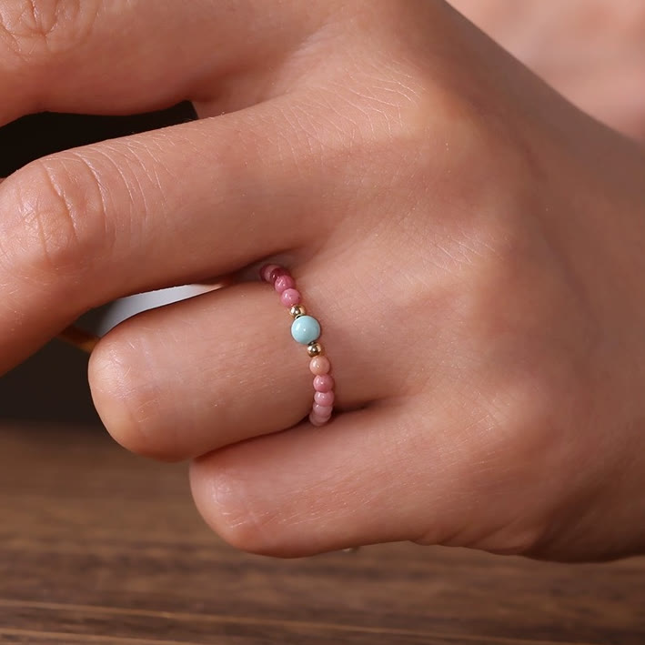 Bague Olivenorma en perles de rhodochrosite extra fines de 2 mm