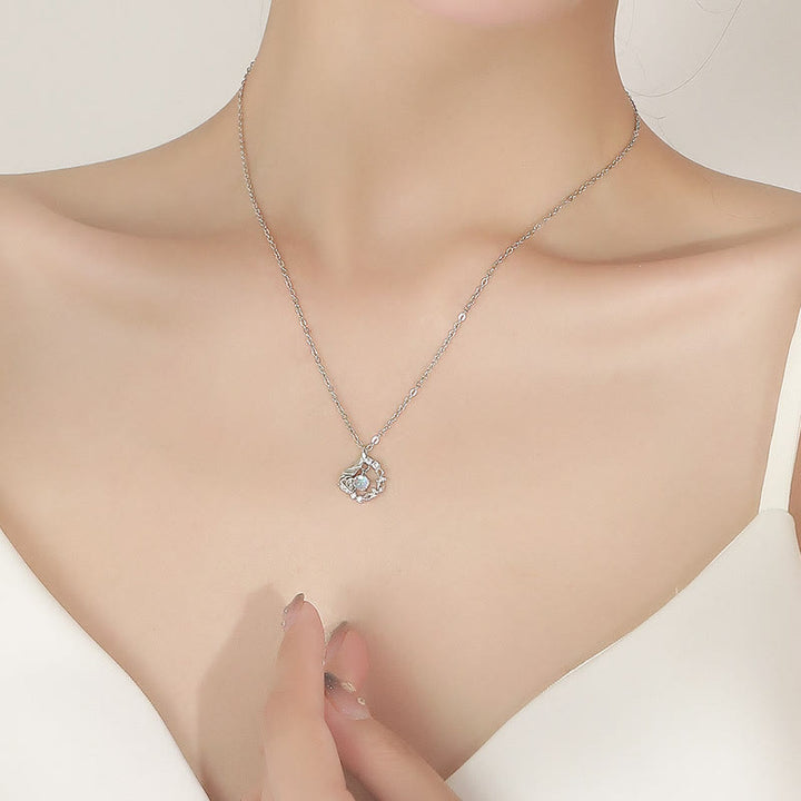 Collier en pierre de lune Olivenorma « Gomme Bleue et Oiseau » 