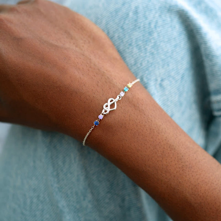 Bracelet personnalisé Olivenorma avec 1 à 8 pierres de naissance et nœud en forme de cœur