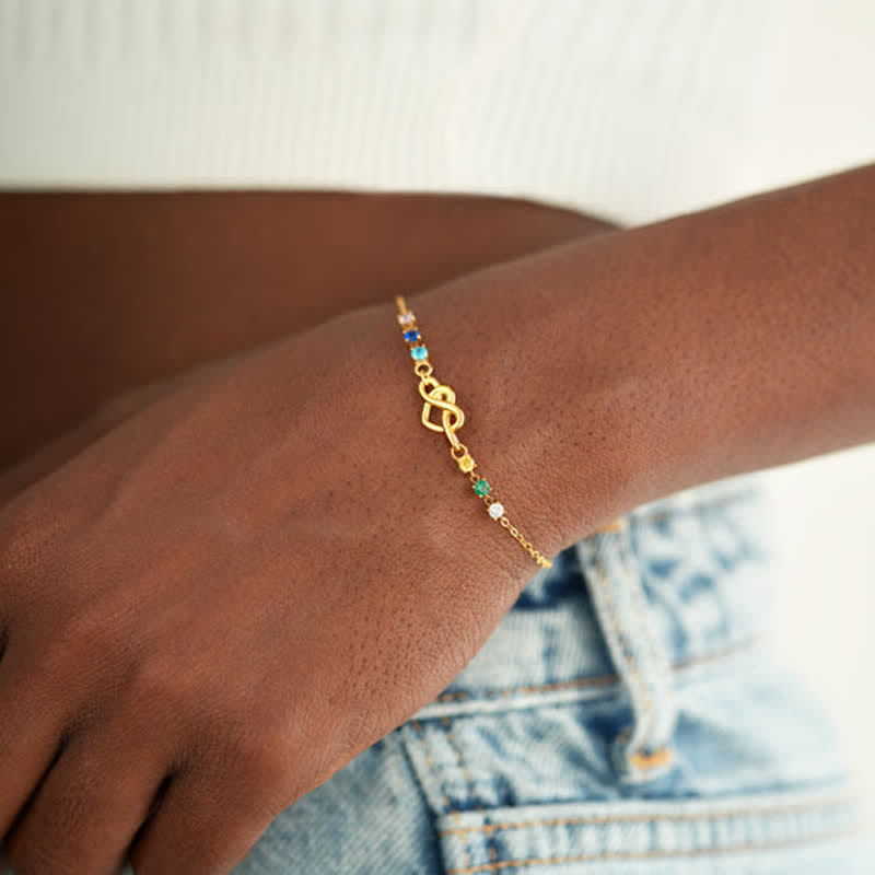 Bracelet personnalisé Olivenorma avec 1 à 8 pierres de naissance et nœud en forme de cœur