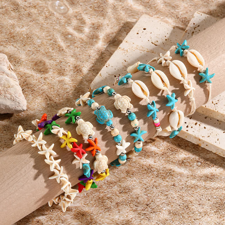 Bracelet de plage avec pendentif tortue étoile de mer turquoise blanche Olivenorma