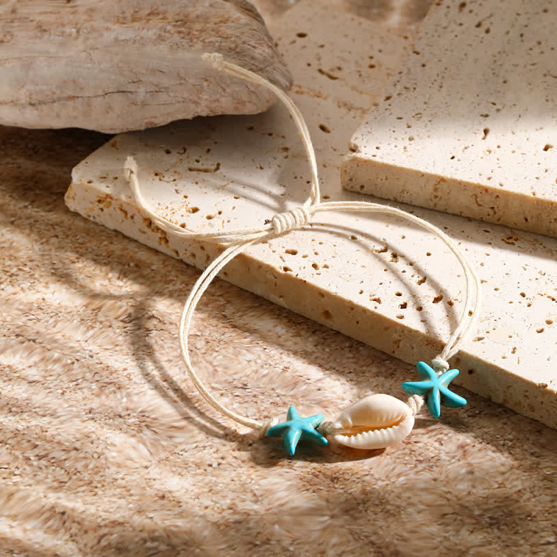 Bracelet de plage avec pendentif tortue étoile de mer turquoise blanche Olivenorma