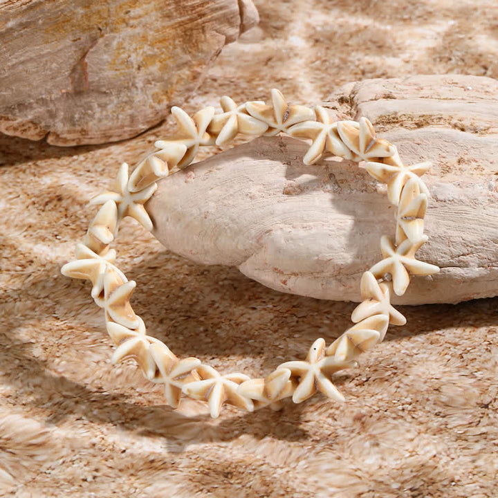 Bracelet de plage avec pendentif tortue étoile de mer turquoise blanche Olivenorma